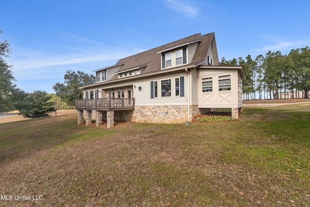 back of house with a yard