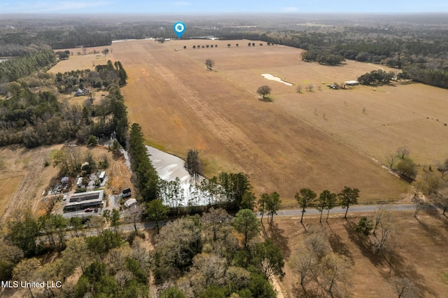 birds eye view of property featuring a rural view