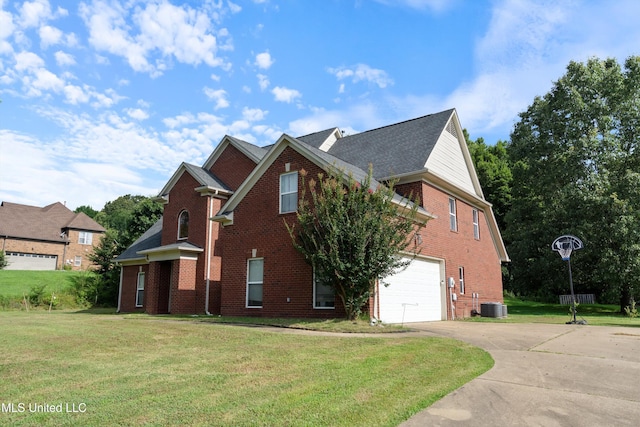 6308 Skyler Rd, Walls, MS 38680 - view of front of house featuring brick siding, driveway, an attached garage, and a front lawn