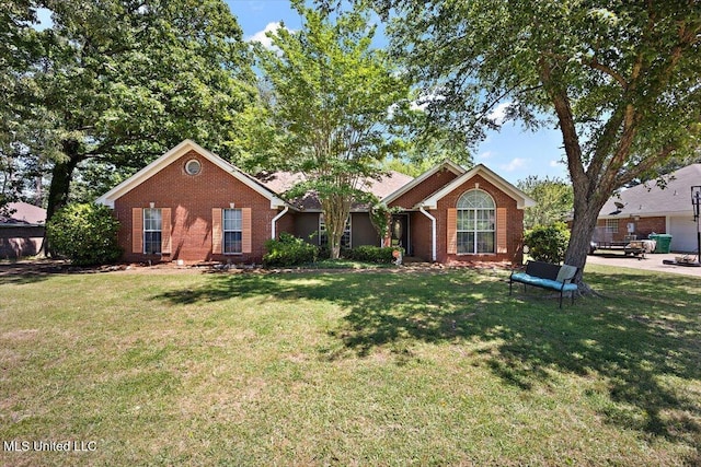 505 Golden Eagle Dr, Byram, MS 39272 - ranch-style home with brick siding and a front yard
