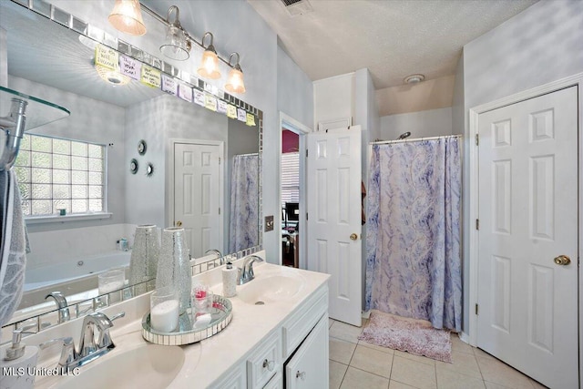 505 Golden Eagle Dr, Byram, MS 39272 - bathroom with double vanity, tile patterned flooring, a bath, a shower with shower curtain, and a textured ceiling