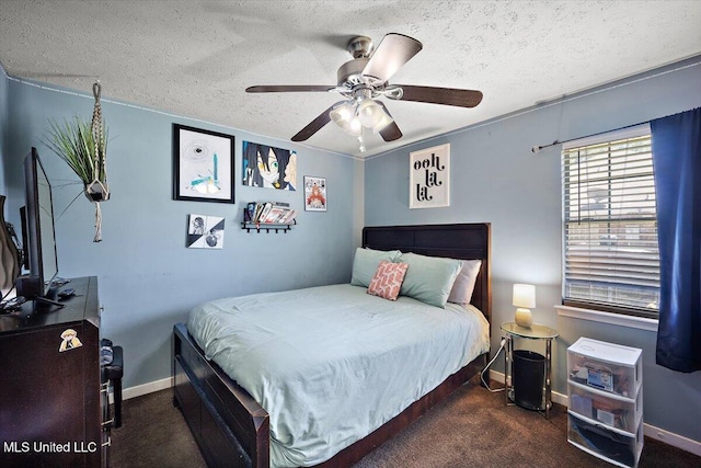505 Golden Eagle Dr, Byram, MS 39272 - bedroom featuring a textured ceiling, carpet, and ceiling fan