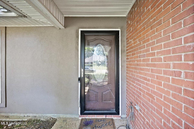 505 Golden Eagle Dr, Byram, MS 39272 - property entrance featuring stucco siding