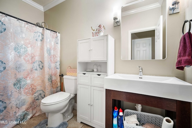 bathroom with tile patterned flooring, vanity, toilet, and crown molding