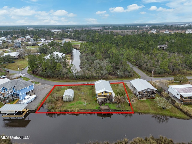 bird's eye view featuring a residential view and a water view