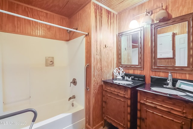 bathroom with wood ceiling, bathtub / shower combination, wood walls, and vanity