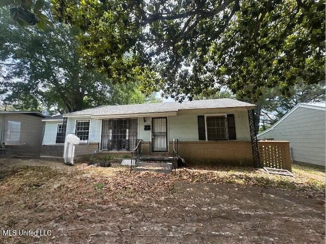 2566 Mcdowell Cir, Jackson, MS 39204 - view of front of house featuring brick siding
