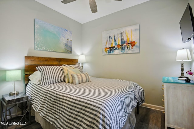 bedroom featuring dark hardwood / wood-style flooring