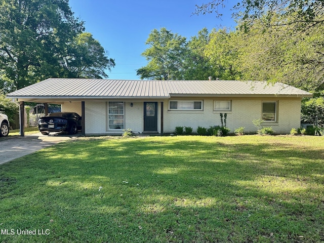 111 Thomas St, Cleveland, MS 38732 - ranch-style house featuring a front lawn, brick siding, metal roof, and an attached carport