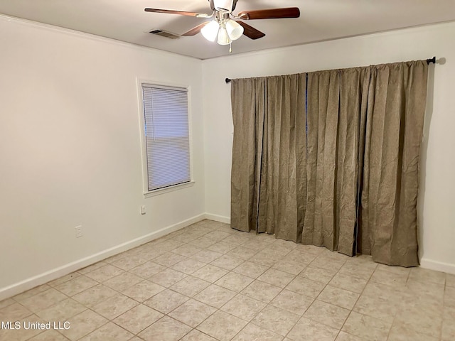 111 Thomas St, Cleveland, MS 38732 - tiled empty room featuring ceiling fan, baseboards, and visible vents