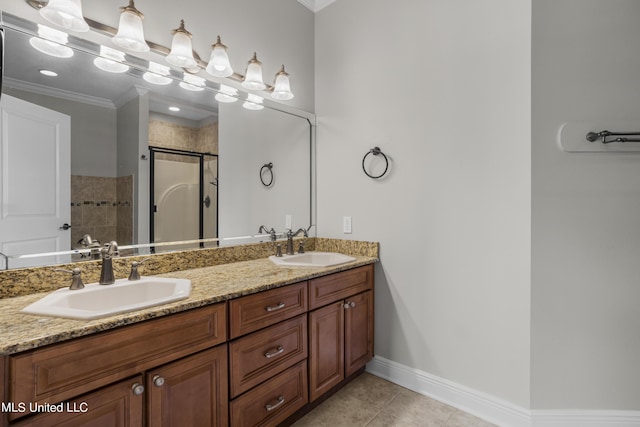 bathroom with walk in shower, ornamental molding, tile patterned floors, and vanity