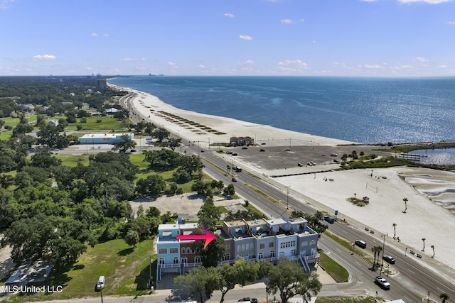 bird's eye view featuring a view of the beach and a water view