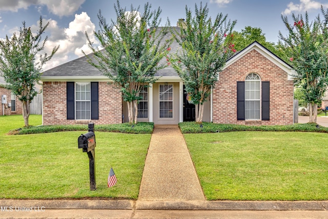 814 Lynwood Ln, Pearl, MS 39208 - ranch-style house with a front lawn, brick siding, and a shingled roof
