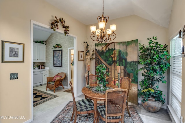 814 Lynwood Ln, Pearl, MS 39208 - dining area with lofted ceiling and a chandelier