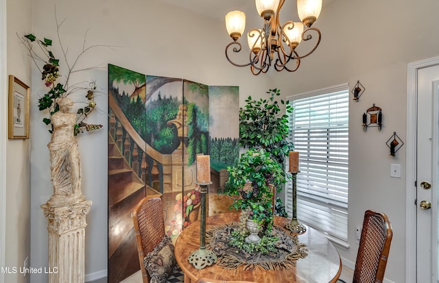 814 Lynwood Ln, Pearl, MS 39208 - dining space featuring a chandelier and baseboards