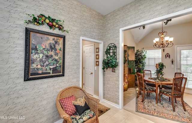 814 Lynwood Ln, Pearl, MS 39208 - dining space featuring a chandelier, light tile patterned floors, and vaulted ceiling