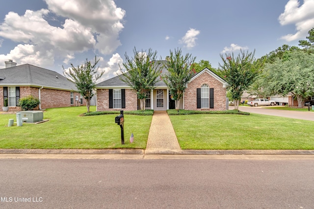 814 Lynwood Ln, Pearl, MS 39208 - view of front of property with brick siding and a front yard