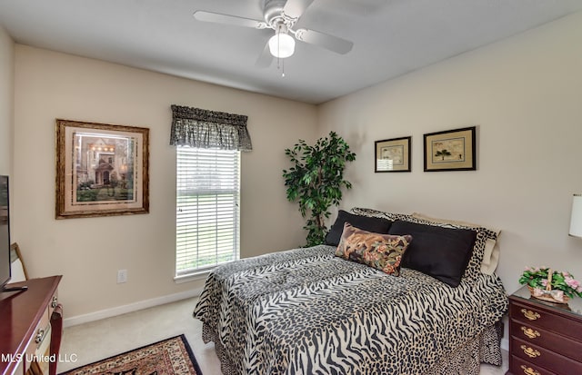 814 Lynwood Ln, Pearl, MS 39208 - bedroom featuring carpet floors, baseboards, and ceiling fan