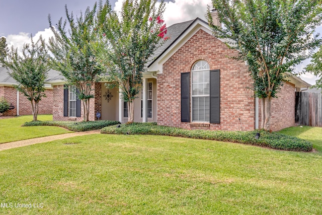 814 Lynwood Ln, Pearl, MS 39208 - ranch-style home with a chimney and brick siding