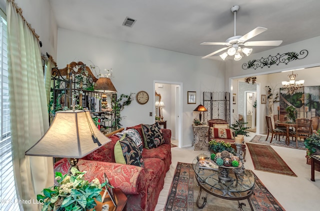 814 Lynwood Ln, Pearl, MS 39208 - carpeted living room with a chandelier and ceiling fan