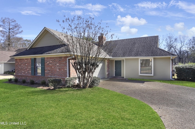 ranch-style house with a garage and a front yard