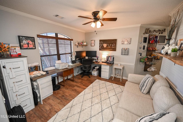 office space featuring ceiling fan, crown molding, a textured ceiling, and hardwood / wood-style flooring