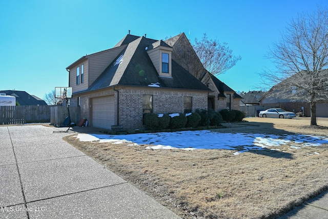 view of property exterior featuring a garage