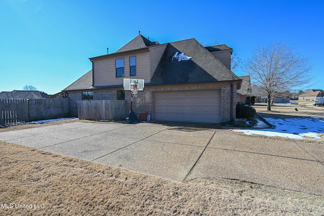 view of home's exterior with a garage