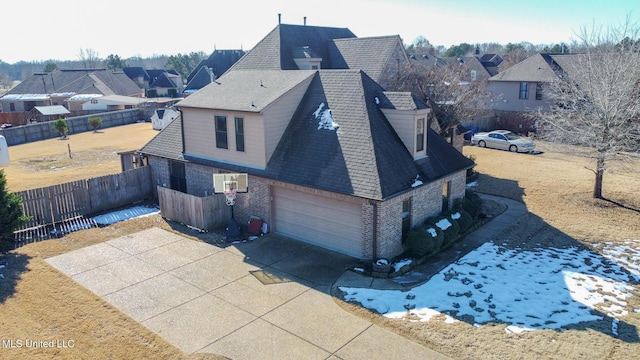 view of side of home featuring a garage