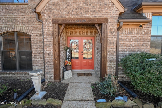 property entrance featuring french doors