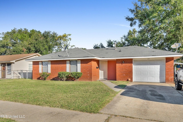 ranch-style house with a front yard and a garage