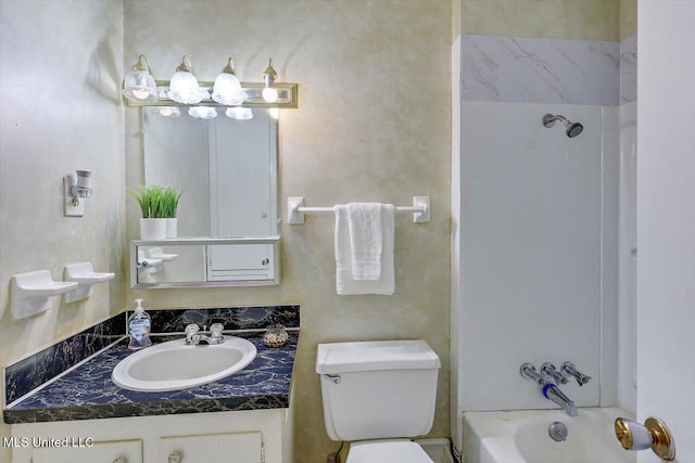 full bathroom with washtub / shower combination, vanity, and toilet