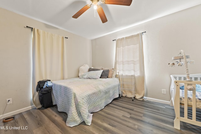 3241 Kings Bridge Rd, Moss Point, MS 39562 - bedroom with baseboards, wood finished floors, and a ceiling fan