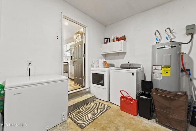 3241 Kings Bridge Rd, Moss Point, MS 39562 - washroom featuring water heater and washing machine and clothes dryer