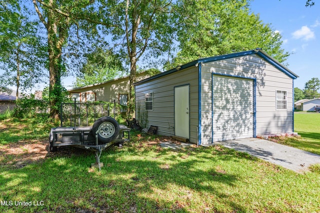 3241 Kings Bridge Rd, Moss Point, MS 39562 - view of outbuilding featuring concrete driveway