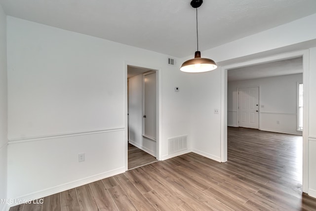 735 Wicklow Pl Unit A, Ridgeland, MS 39157 - empty room with wood finished floors and baseboards