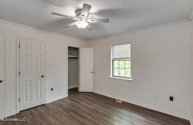 735 Wicklow Pl Unit A, Ridgeland, MS 39157 - unfurnished bedroom with dark wood-type flooring, ornamental molding, baseboards, and a closet