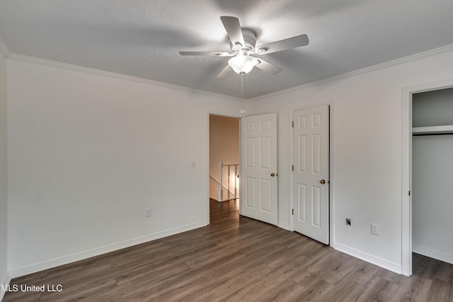 735 Wicklow Pl Unit A, Ridgeland, MS 39157 - unfurnished bedroom with wood finished floors, ornamental molding, baseboards, and a ceiling fan