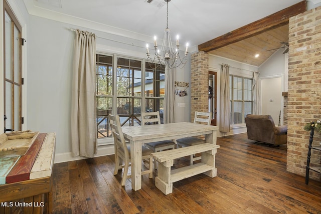 dining room with dark hardwood / wood-style floors, a chandelier, and lofted ceiling with beams