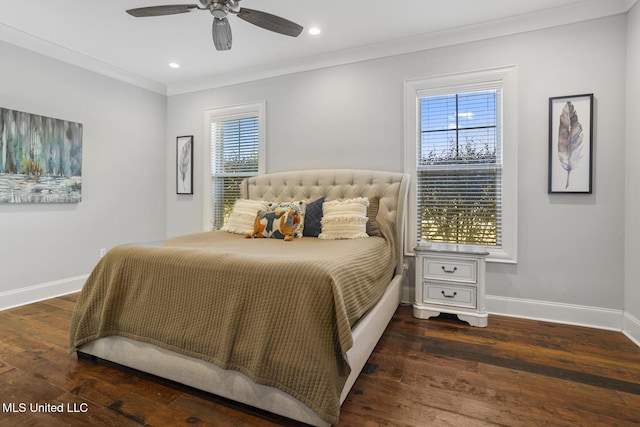 bedroom with dark hardwood / wood-style flooring, ornamental molding, and ceiling fan