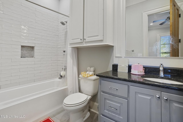 full bathroom with vanity, toilet, ceiling fan, and shower / bathtub combination with curtain