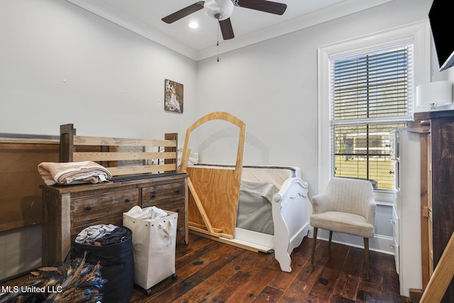 bedroom featuring crown molding, ceiling fan, and dark hardwood / wood-style flooring