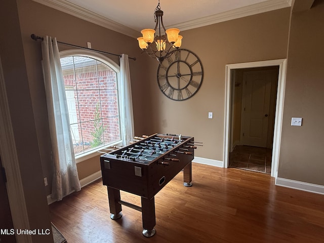 104 Belle Oak Dr, Brandon, MS 39042 - rec room featuring crown molding, a chandelier, wood finished floors, and baseboards