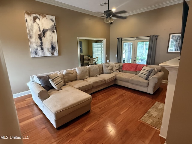 104 Belle Oak Dr, Brandon, MS 39042 - living area with ornamental molding, wood finished floors, ceiling fan, french doors, and baseboards