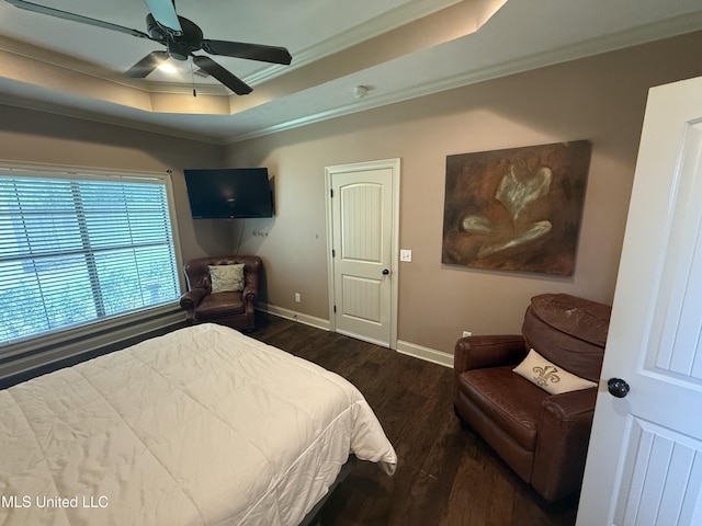 104 Belle Oak Dr, Brandon, MS 39042 - bedroom with ornamental molding, a tray ceiling, dark wood-style floors, baseboards, and ceiling fan