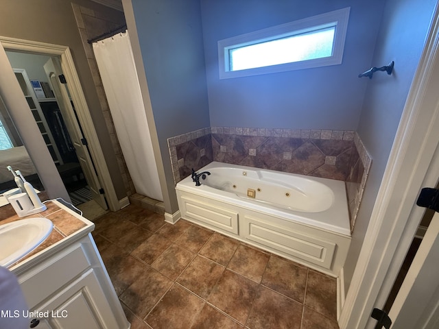 104 Belle Oak Dr, Brandon, MS 39042 - full bathroom with a tub with jets, vanity, and a shower with curtain