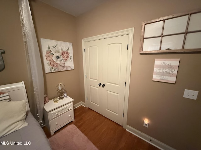 104 Belle Oak Dr, Brandon, MS 39042 - bedroom featuring wood finished floors, baseboards, and a closet