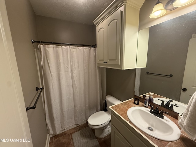 104 Belle Oak Dr, Brandon, MS 39042 - full bathroom with toilet, vanity, a textured ceiling, a shower with shower curtain, and tile patterned floors
