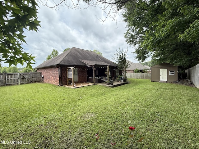 104 Belle Oak Dr, Brandon, MS 39042 - back of house with a patio area, brick siding, and a shingled roof