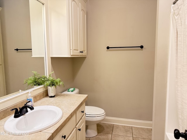 128 Charlton Dr, Madison, MS 39110 - full bathroom with tile patterned floors, toilet, vanity, baseboards, and a shower with curtain
